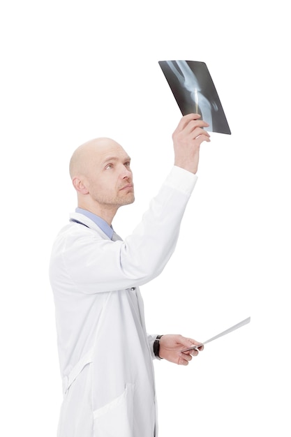 Experienced therapist examining a radiograph of the patient