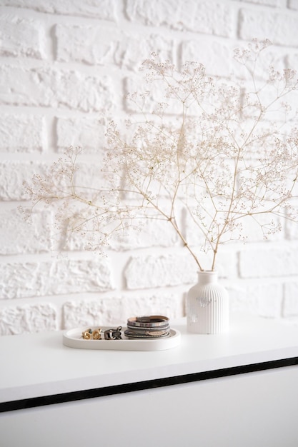 Photo explore chic home decor ideas with a minimalist branch arrangement for any space