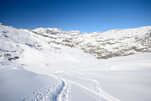 Exploring the Alps by ski touring, snow capped mounatins