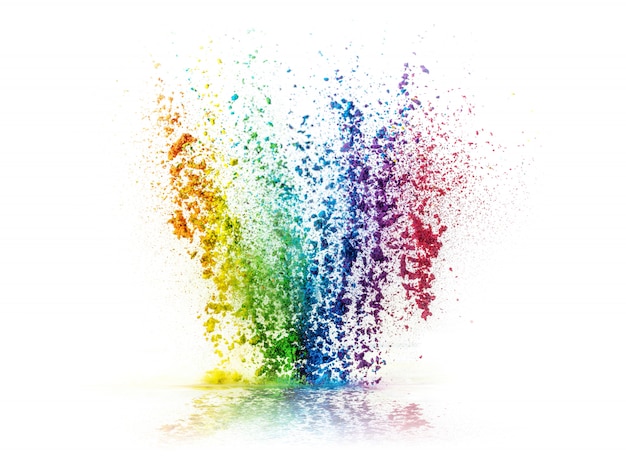 Explosion of colored powder on white background