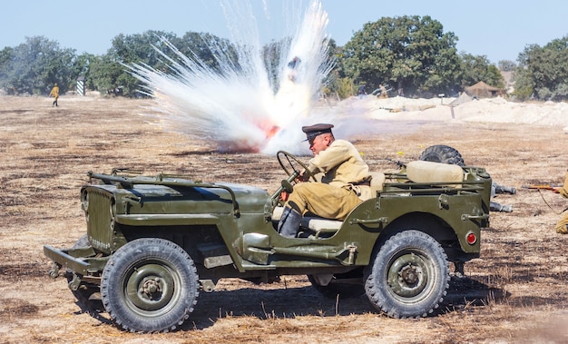 Explosions of shells and bombs, smoke