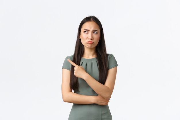 Expressive young Asian woman posing