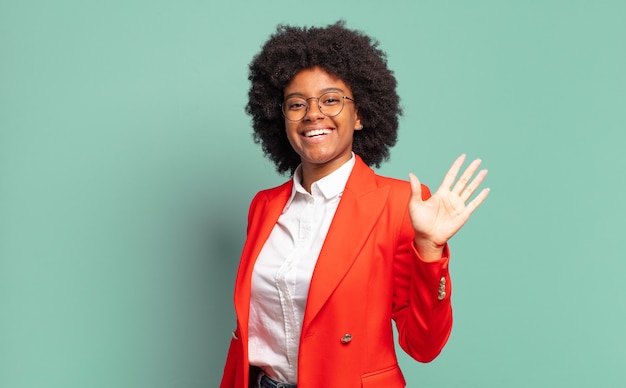 Expressive young pretty black woman gesturing