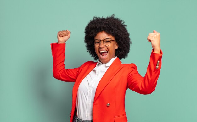 Expressive young pretty black woman gesturing