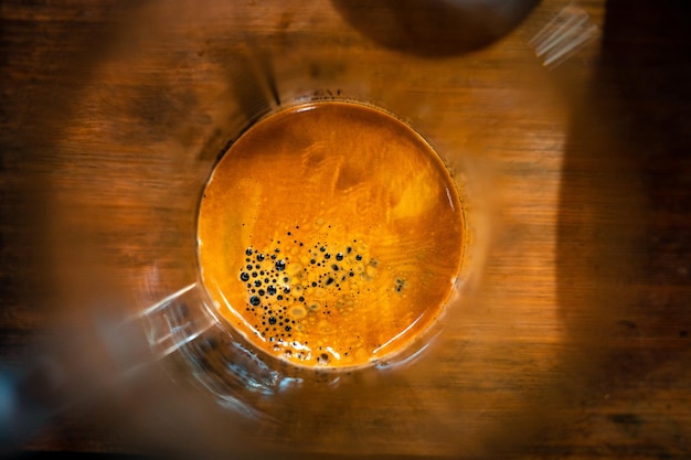 Expresso coffee dripping from the machine