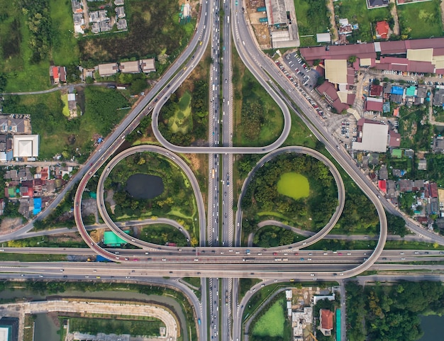 Expressway with car lots in the city in Thailand. 