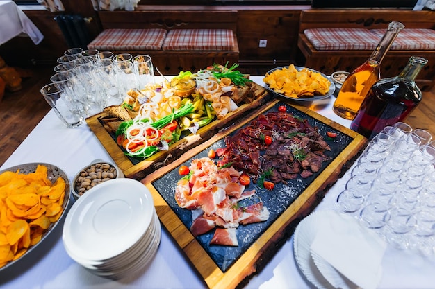 Exquisite wedding table with snacks Cossack table Appetizer table arranged for a festive dinner