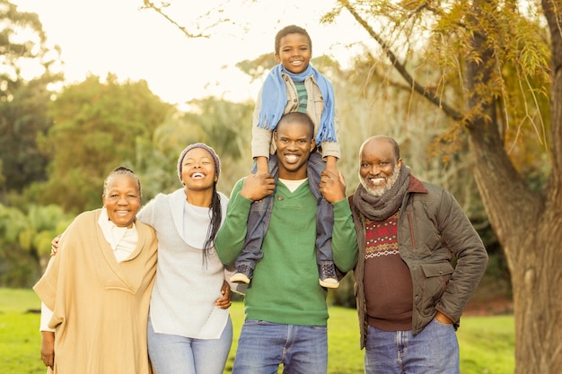 Extended family posing with warm clothes