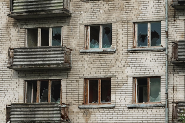 Exterior of abandoned apartment building in european ghost town