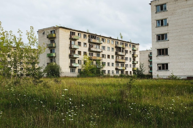 Exterior of abandoned apartment buildings in european ghost town