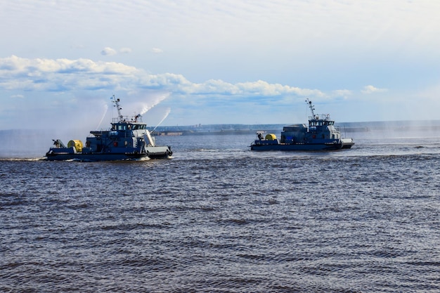 Extinguishing a burning ship during naval exercises