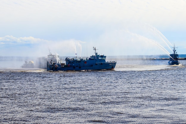 Extinguishing a burning ship during naval exercises