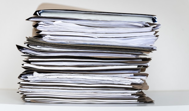 Extremely Close up Stack of Documents Folders on Office Desk