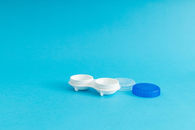 Eye lens case on blue background