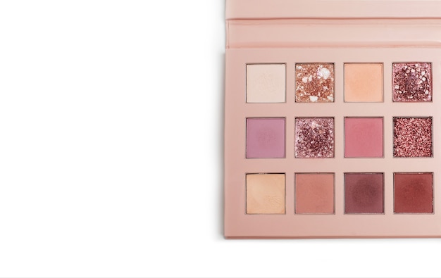 Eyeshadow palette of pink colors with shimmer and matte texture on a white background