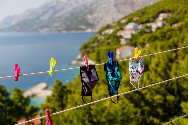 Fabric face masks hanging on the clothesline