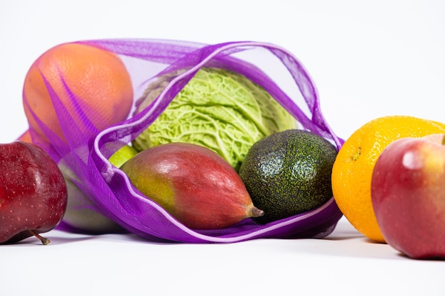 Fabric mesh for fruits and vegetables on a white background