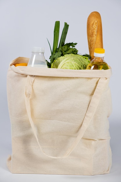 Fabric reusable bag with groceries