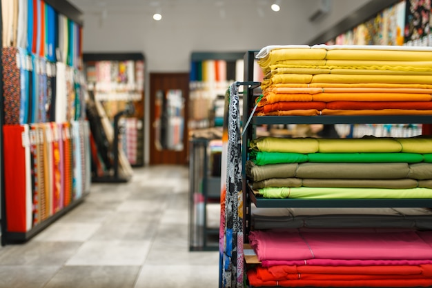 Fabric on shelves in textile store