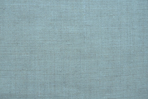 Fabric texture background blue fabric with weave natural slightly wrinkled look of the material unif