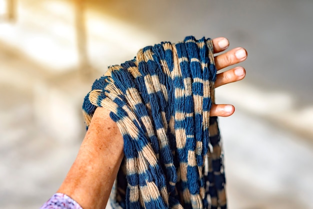 Fabric that has been dyed with indigo Ready for weaving, Sakon Nakhon, Thailand