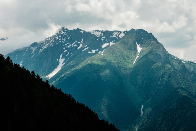 Fabulous magnificent view of Caucasus Mountains and sky