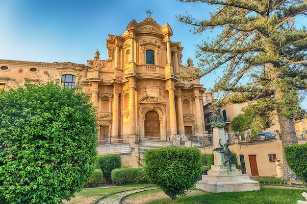 Facade of the church of San Domenico baroque masterpiece and major landmark in Noto picturesque town in Sicily Italy