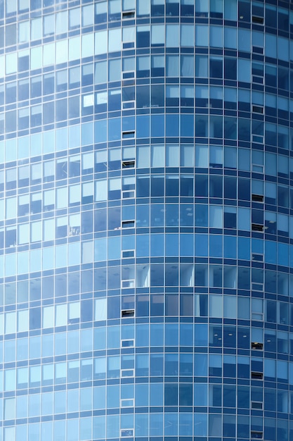 Facade of a glass building. Vertically.