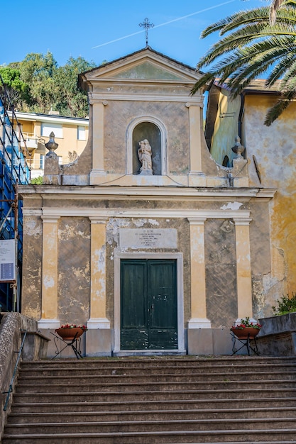 Facade of a little church in the maritime village of Moneglia on the Italian Riviera