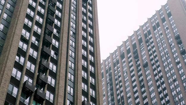 Facade of modern architecture residential building in cloudy weather Contemporary highrise building exterior