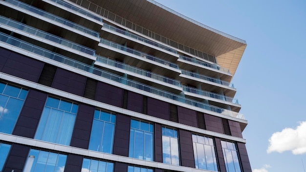 Facade of a residential building fragment low angle view against the sky