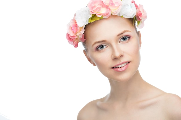 Face of a beautiful young woman on a white background