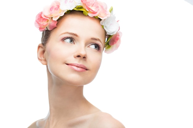 Face of a beautiful young woman on a white background