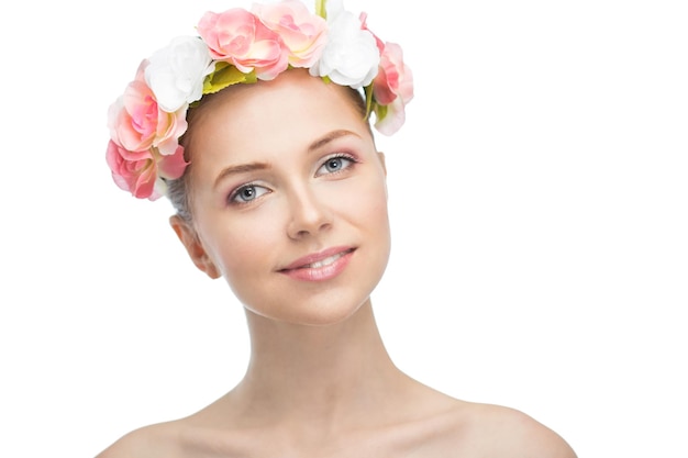 Face of a beautiful young woman on a white background