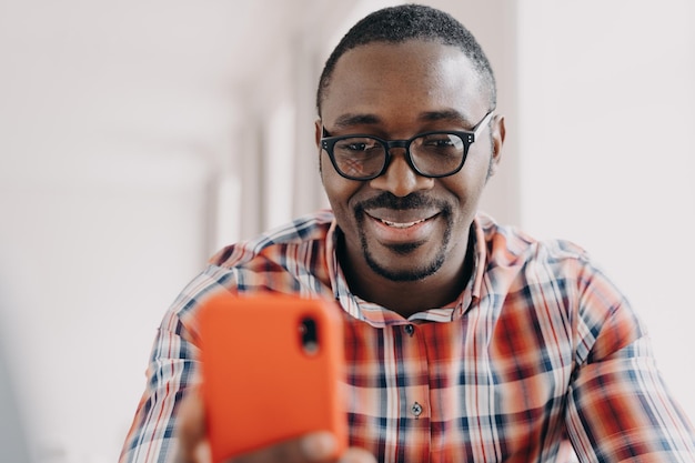 Face of happy african american man Freelancer is working remotely from home on quarantine