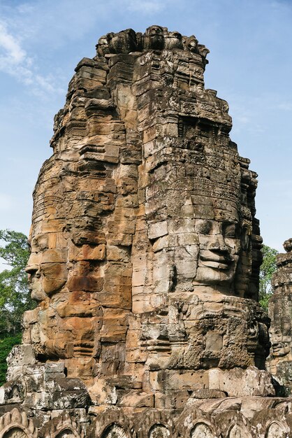 Photo faces in the stone in bayon temple, angkor, cambodia.