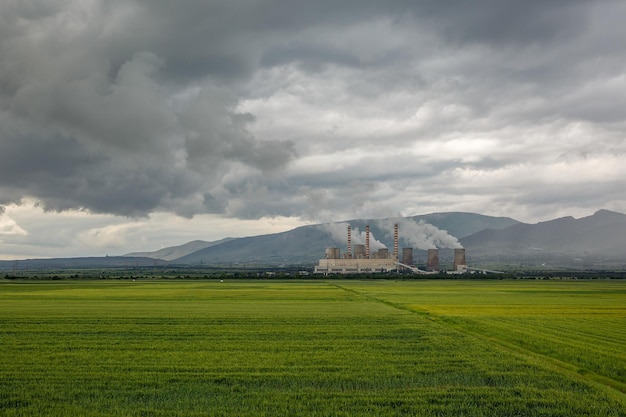 Factory in green field Cloudy