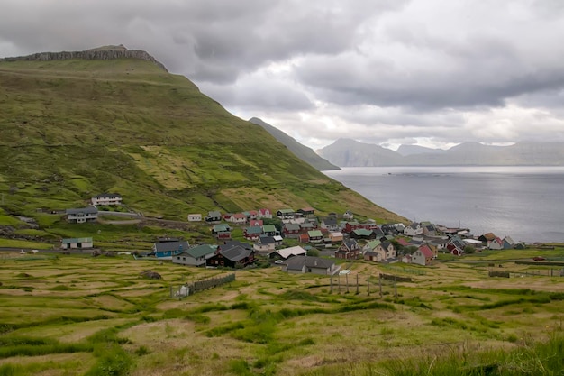 Faer Oer Island view on cloudy background