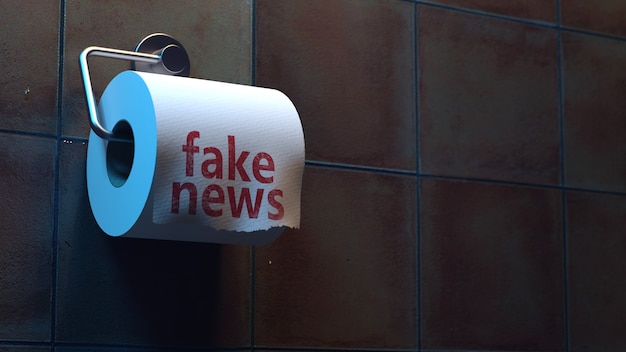 fake news inscription on toilet paper in the toilet