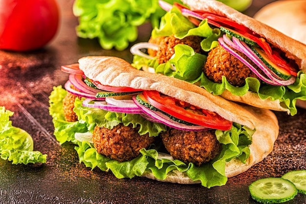 Falafel and fresh vegetables in pita bread