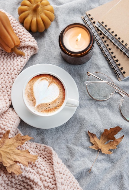 Fall flat lay with coffee and autumn decor