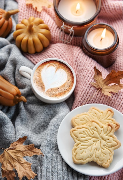 Fall flat lay with coffee and autumn decor