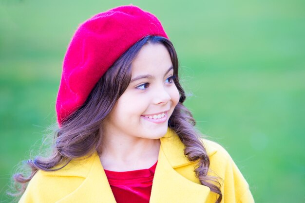 Fall hat fashion accessory French trend fall season Charming french style fashionable girl Fall fashion concept Hat accessory french fashion detail Kid girl bright hat beret long curly hair