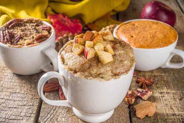 Fall and winter sweet dessert.  Traditional Autumn Cakes, Microwave Mug Pies -  Mug Pumpkin Pie, Apple Crumble Crisp Pie, Pecan Mug Cake