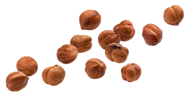 Falling hazelnuts isolated on white background with clipping path, nuts collection