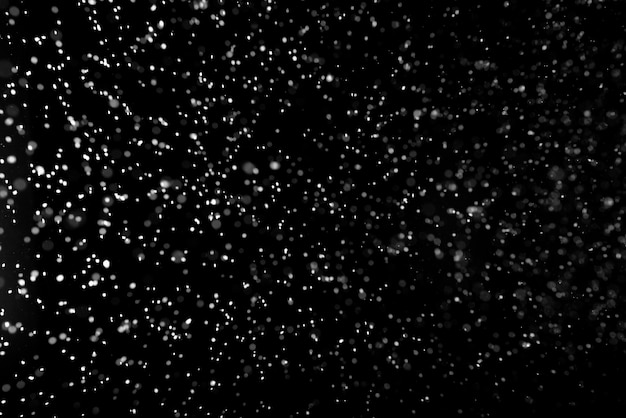 Falling Snow down On The Black Background