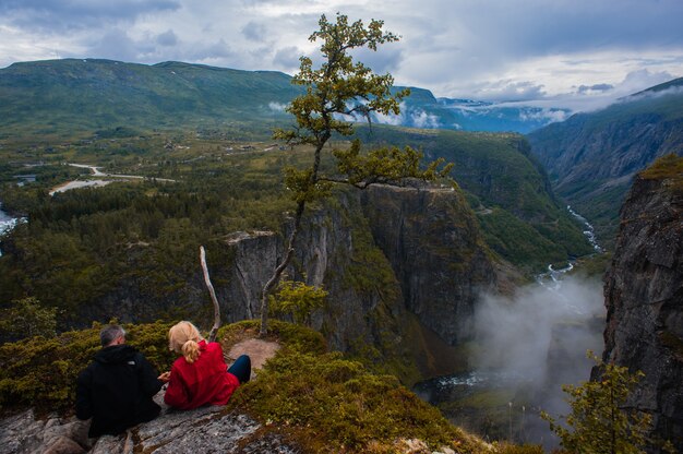 Photo falls in mountains of norway in rainy weather.