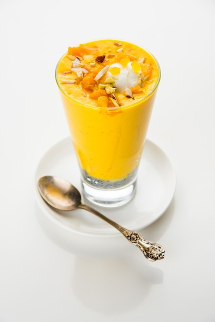 Falooda or Faluda is a popular Indian dessert - Strawberry and Mango flavoured which has Ice cream, noodles, sweet basil seeds and nuts, selective focus