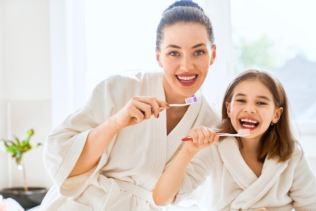 Family are brushing teeth