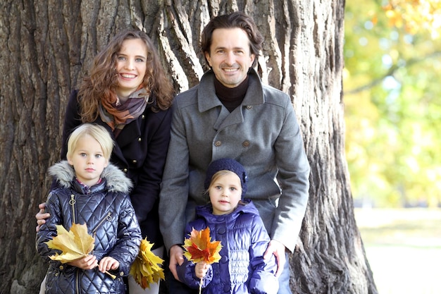 Family in autumn park